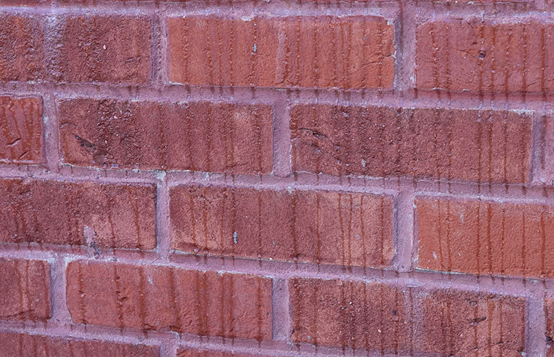 Water beading off masonry with 3C Weather Defy Masonry Protection Cream